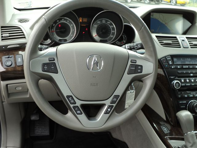 2010 Acura MDX 2006 Mercury Premier