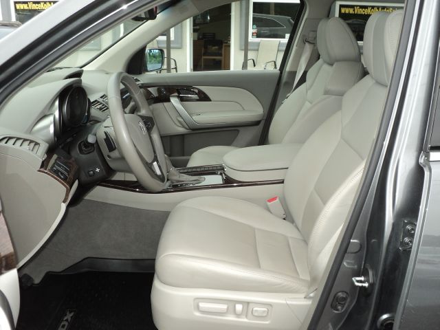 2010 Acura MDX 2006 Mercury Premier