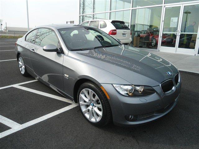 2009 BMW 3 series 2011 Chevrolet LT