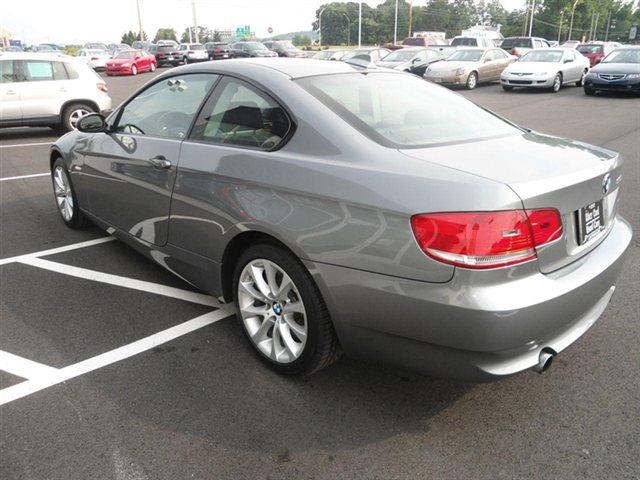 2009 BMW 3 series 2011 Chevrolet LT