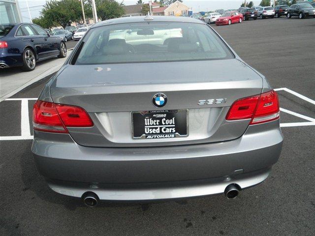 2009 BMW 3 series 2011 Chevrolet LT