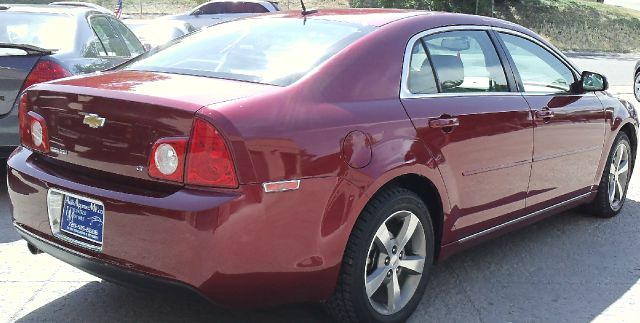 2009 Chevrolet Malibu 2003 Mazda LX