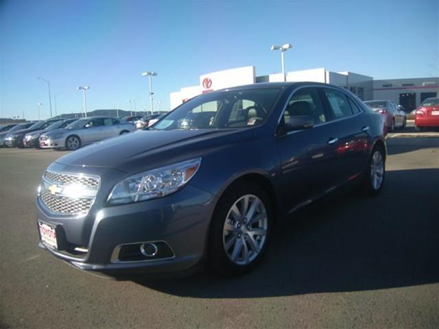 2013 Chevrolet Malibu 2010 Kia SX