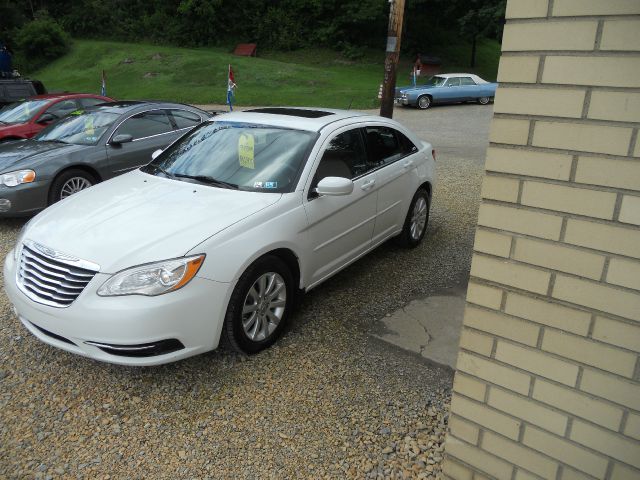 2011 Chrysler 200 2004 Jeep Sport