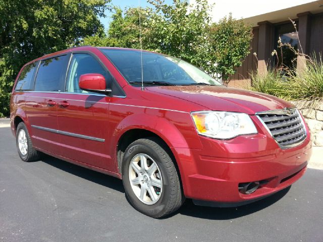 2010 Chrysler Town and Country 2007 Mazda Mazda3 S Sport