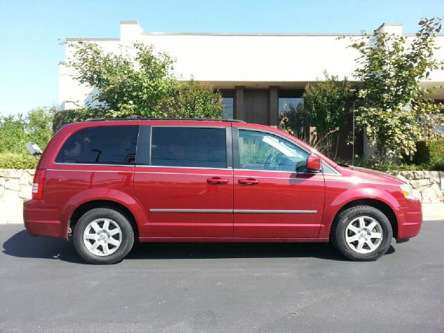 2010 Chrysler Town and Country 2007 Mazda Mazda3 S Sport