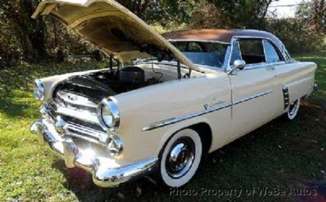 1952 Ford Crestliner 1995 Pontiac