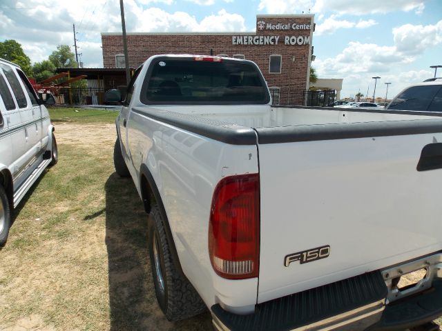 1999 Ford E150 SLT 25