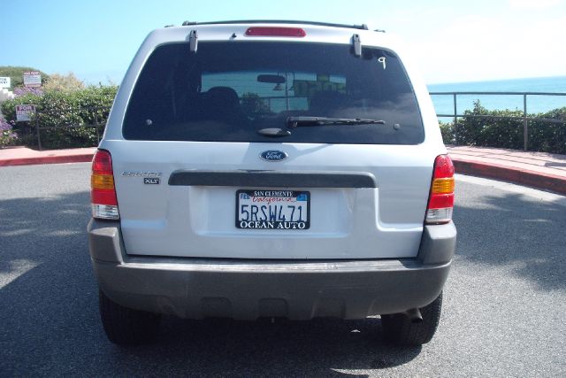 2002 Ford Escape 2008 Toyota LE