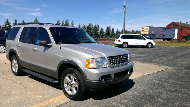 2003 Ford Explorer 2002 Mazda DX