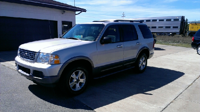 2003 Ford Explorer 2002 Mazda DX