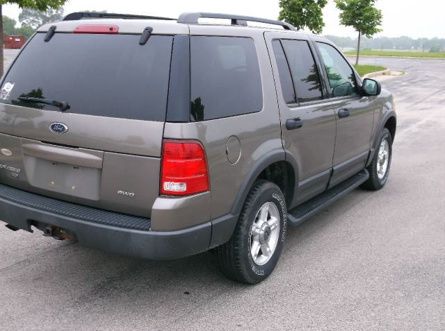 2003 Ford Explorer 2002 Mazda DX