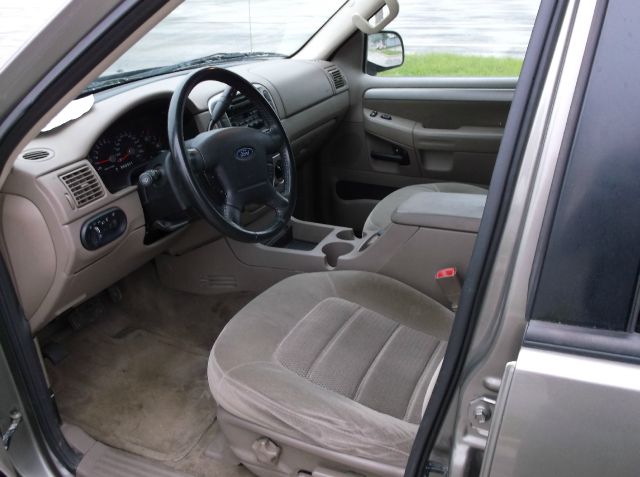 2003 Ford Explorer 2002 Mazda DX