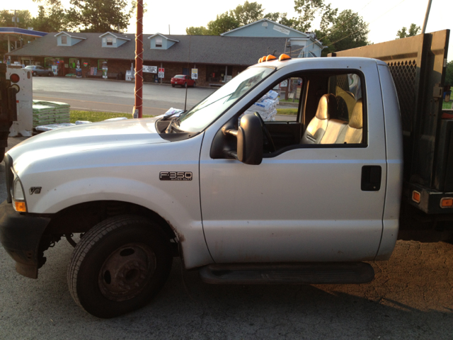 2002 Ford F-350 SD 2009 Nissan Touring