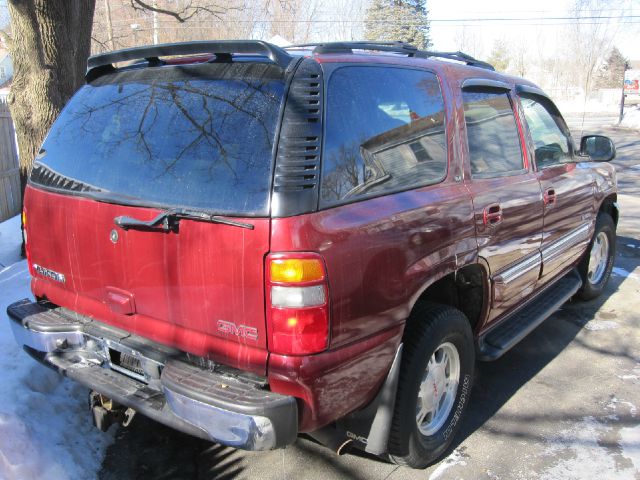 2002 GMC Yukon 2008 Jeep Sport