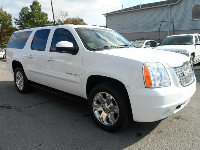 2009 GMC Yukon XL 2006 Mercury