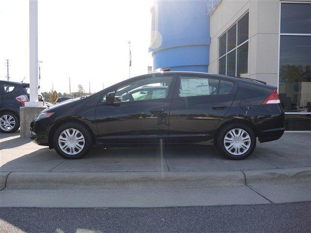 2011 Honda Insight 2005 Toyota Sport