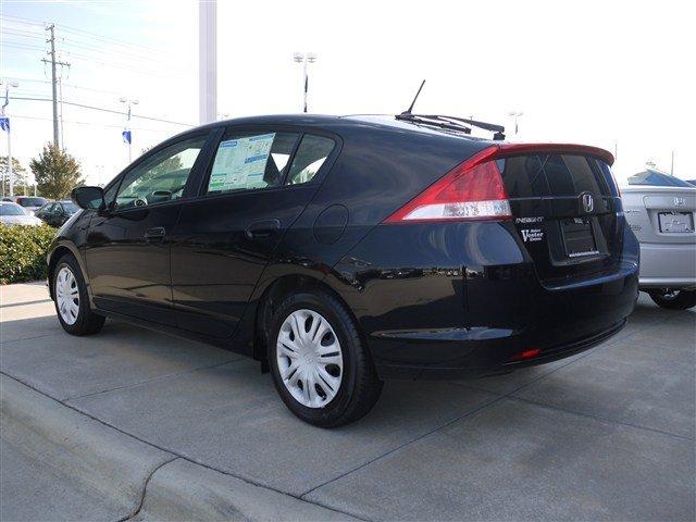 2011 Honda Insight 2005 Toyota Sport