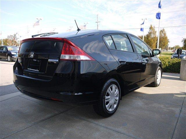 2011 Honda Insight 2005 Toyota Sport