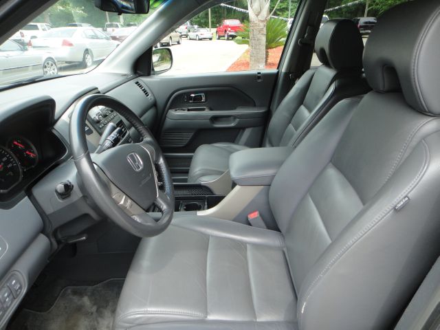 2006 Honda Pilot 2010 Cadillac CTS