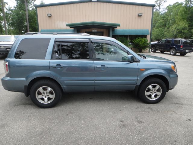 2006 Honda Pilot 2010 Cadillac CTS