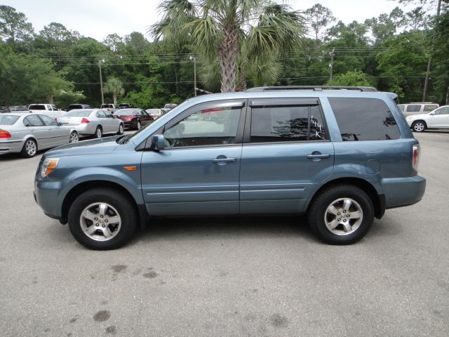 2006 Honda Pilot 2010 Cadillac CTS