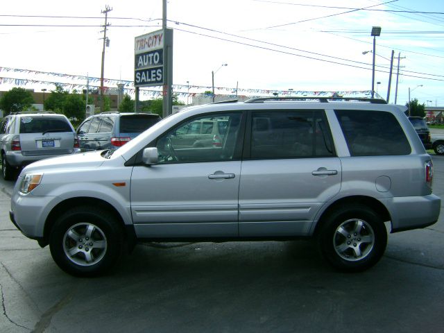 2006 Honda Pilot 2010 Cadillac CTS