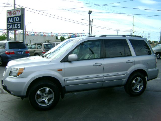 2006 Honda Pilot 2010 Cadillac CTS