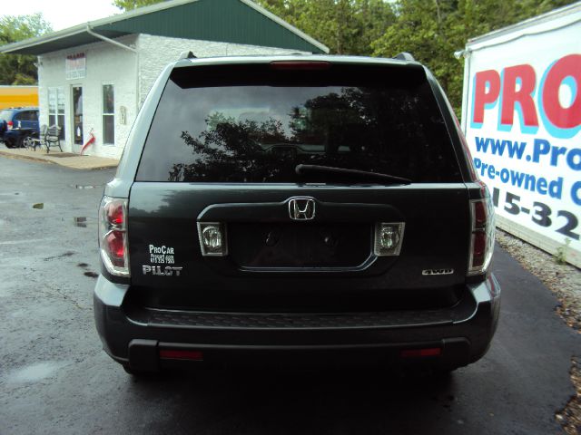 2006 Honda Pilot 2010 Cadillac CTS