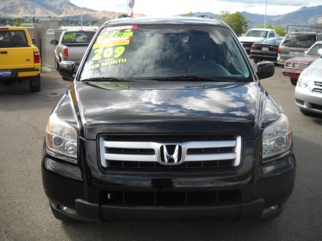 2006 Honda Pilot 2010 Cadillac CTS