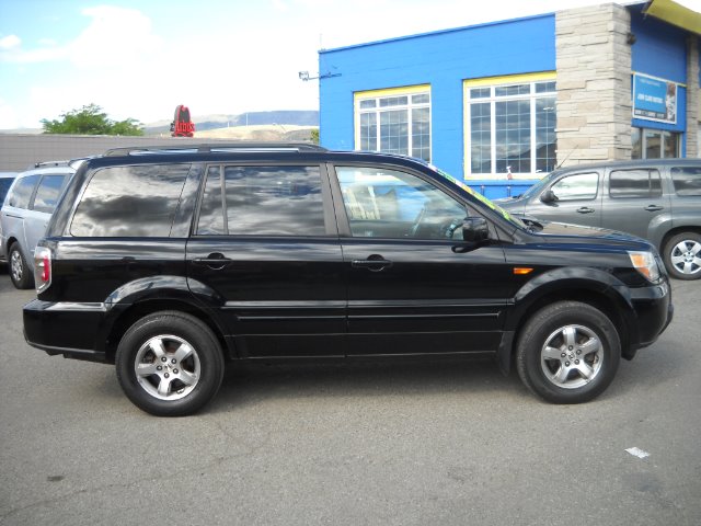 2006 Honda Pilot 2010 Cadillac CTS