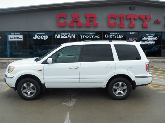 2006 Honda Pilot 2010 Cadillac CTS