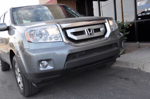 2009 Honda Pilot 2008 Nissan XE