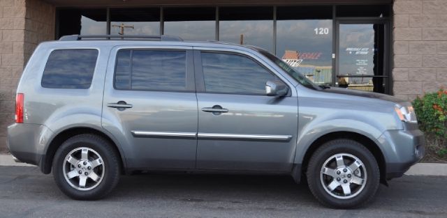 2009 Honda Pilot 2008 Nissan XE