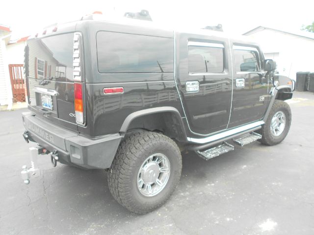 2004 Hummer H2 Scion XB