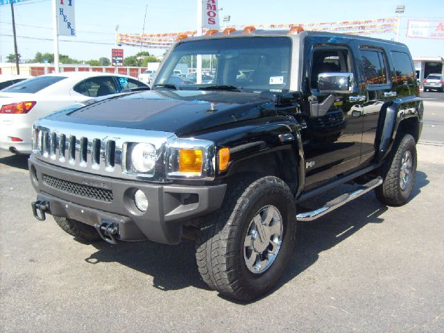 2006 Hummer H3 Scion XB