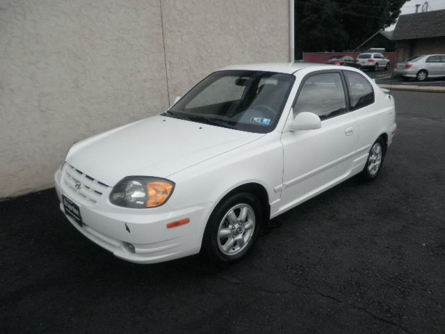 2003 Hyundai Accent 2000 Dodge SLT