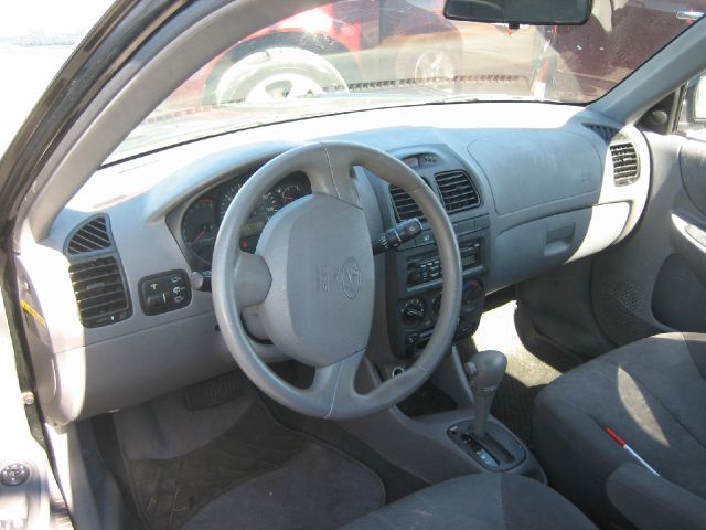 2003 Hyundai Accent 2000 Dodge SLT