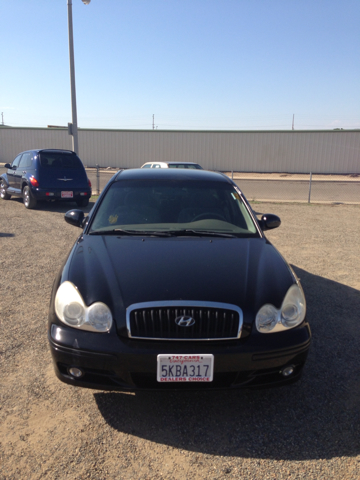 2004 Hyundai Accent 2000 Dodge SLT