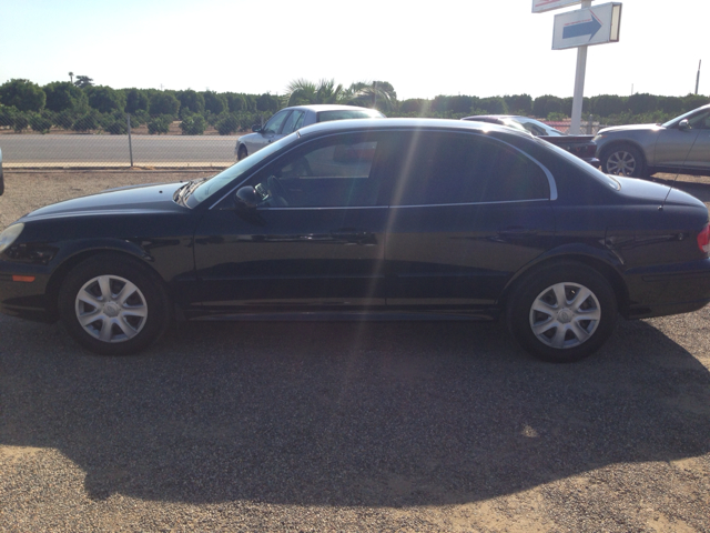 2004 Hyundai Accent 2000 Dodge SLT