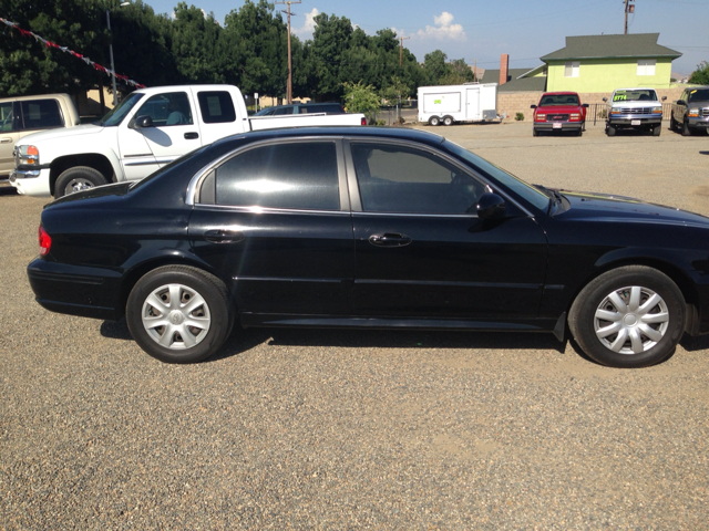 2004 Hyundai Accent 2000 Dodge SLT