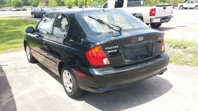 2004 Hyundai Accent 2000 Dodge SLT