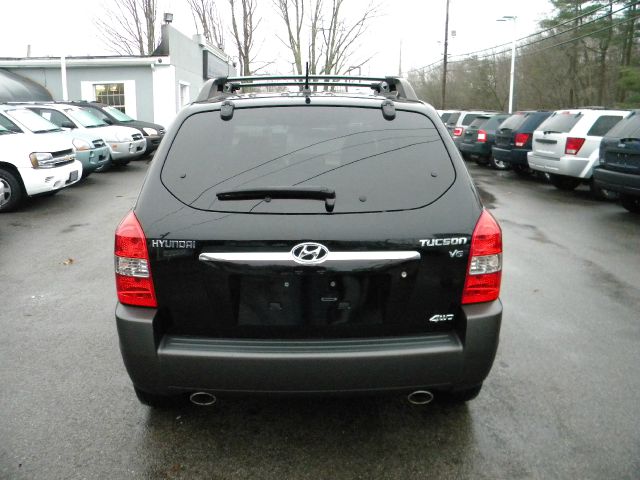 2005 Hyundai Tucson 2002 Saturn