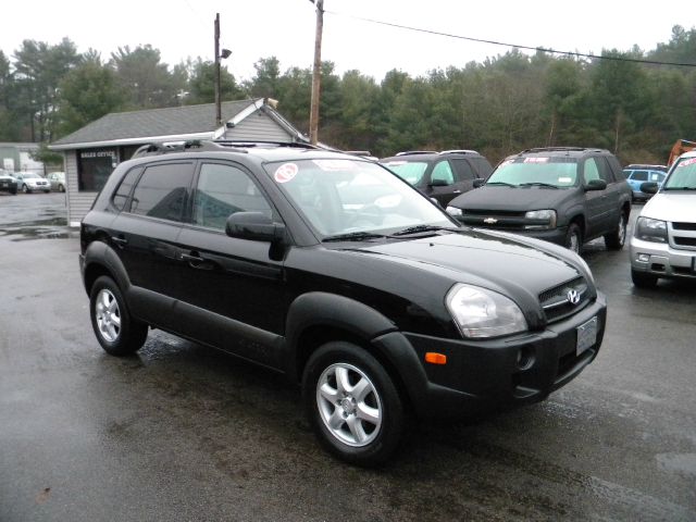 2005 Hyundai Tucson 2002 Saturn