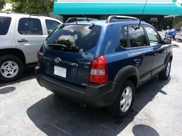 2005 Hyundai Tucson 2002 Saturn