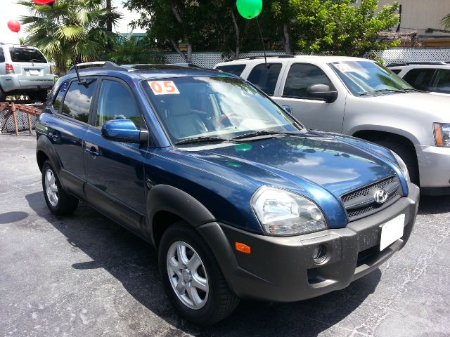 2005 Hyundai Tucson 2002 Saturn