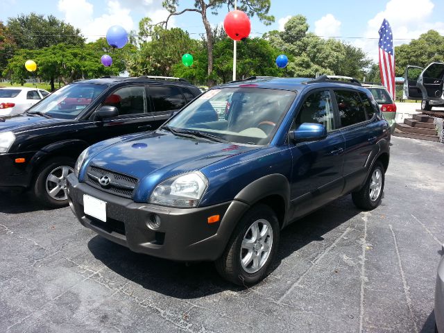 2005 Hyundai Tucson 2002 Saturn