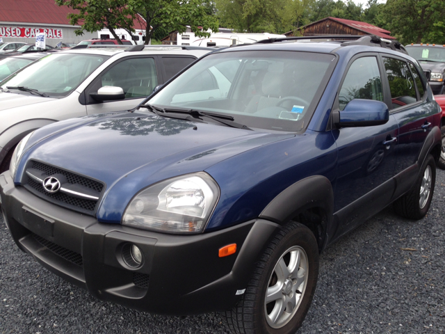 2005 Hyundai Tucson 2002 Saturn