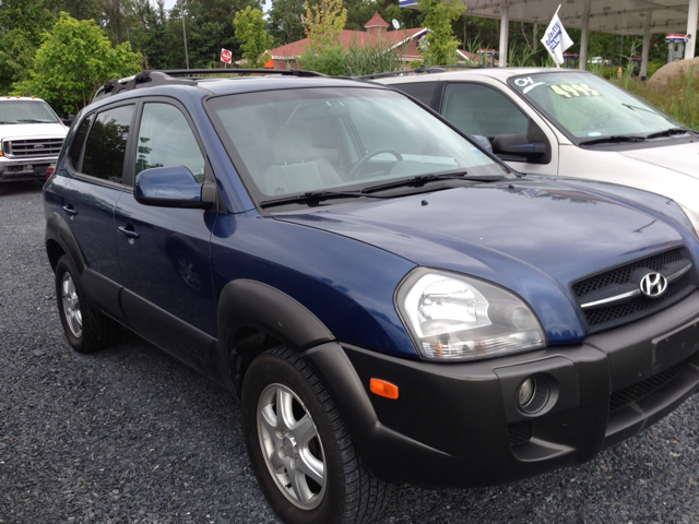 2005 Hyundai Tucson 2002 Saturn