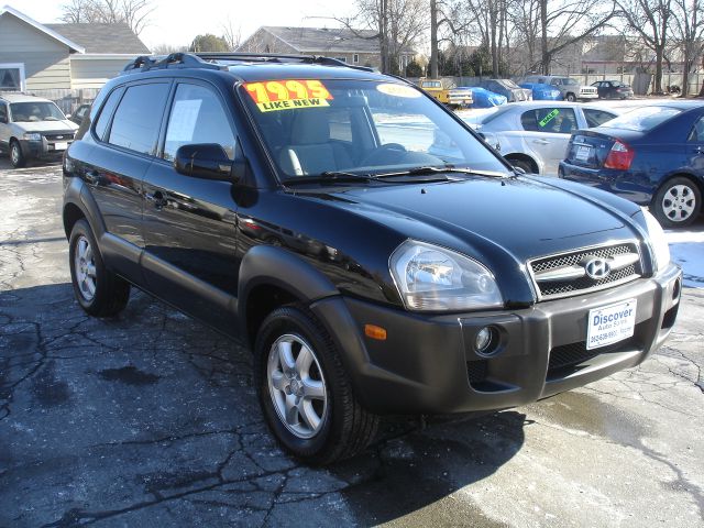 2005 Hyundai Tucson 2002 Saturn